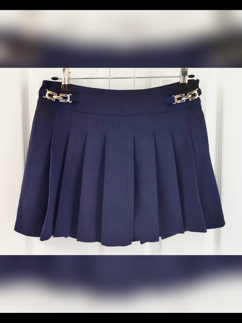 Navy Pleated Mini Skirt with Gold Buckle Accents